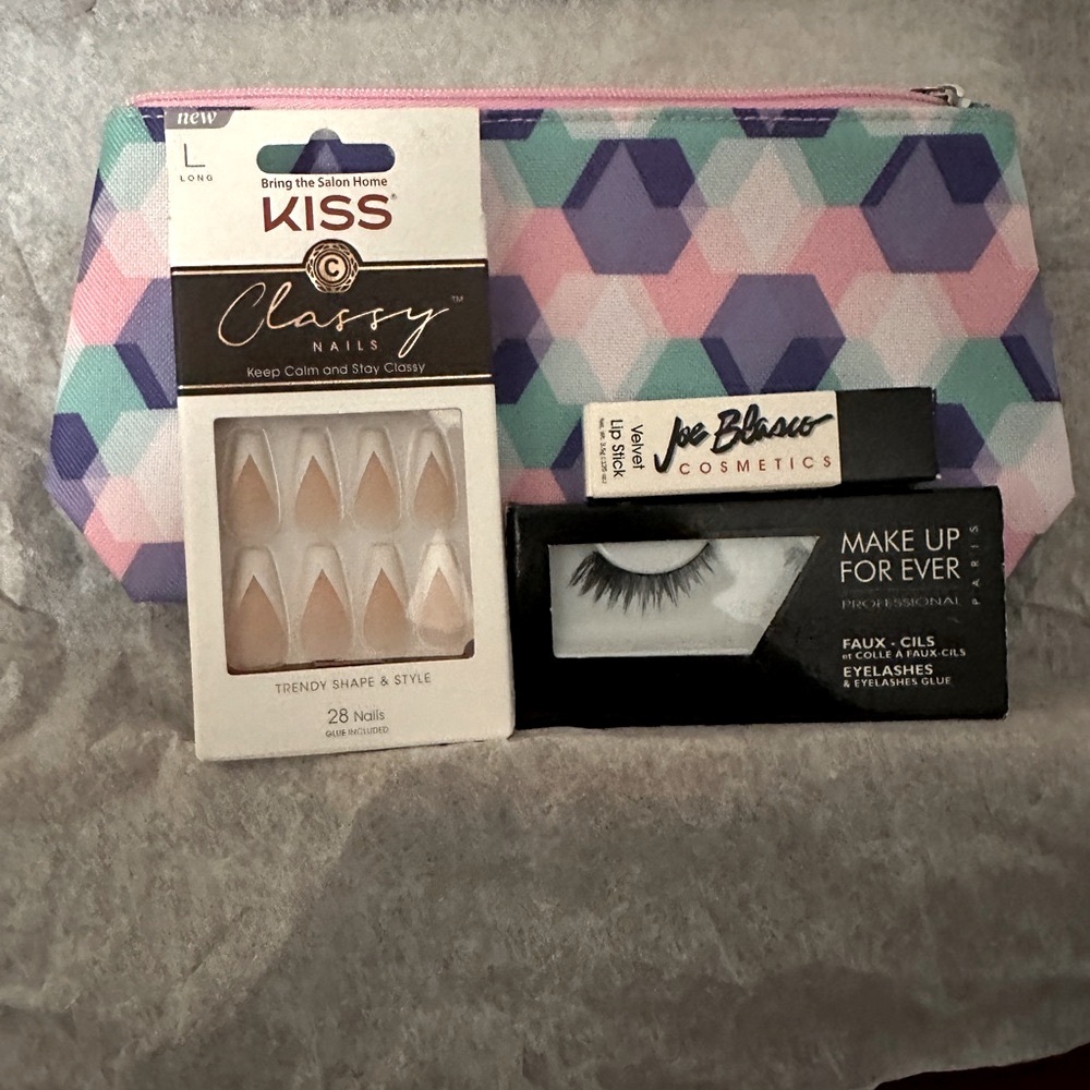 Women’s Makeup Forever eye,lashes ,nails , coral lipstick